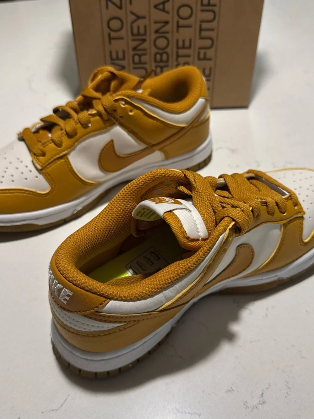 Nike Kids Low-Top Sneakers in White and Mustard Yellow